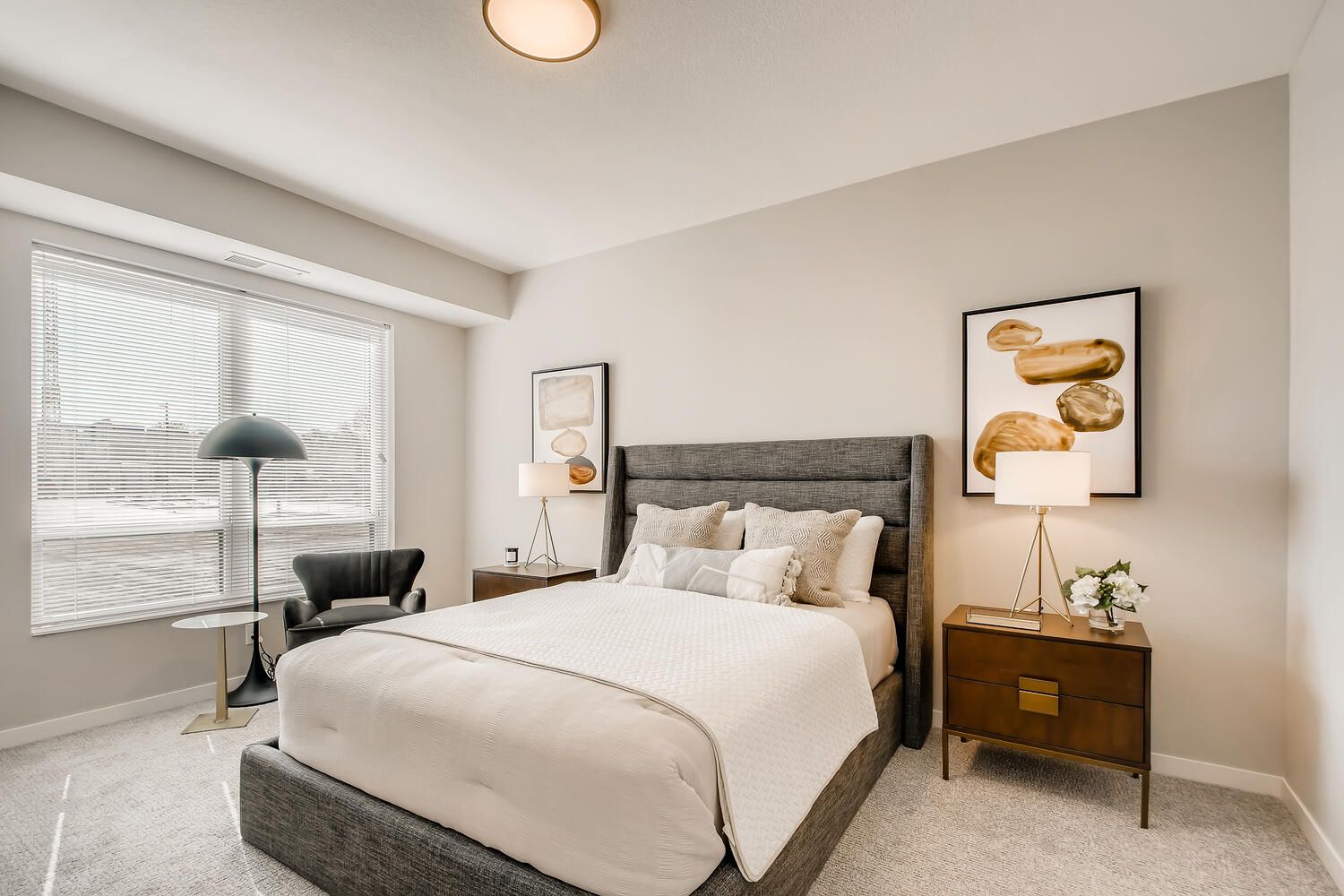 Furnished bedroom with windows